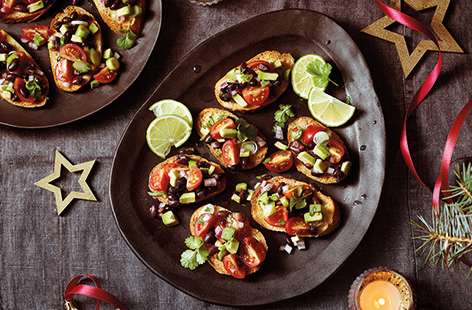 Pile up your favourite Mexican flavours on crisp baguette for these easy Mexican crostini. Prep a colourful salsa with black beans, tomatoes and avocado ahead of time, then spoon onto the crostini once your guests arrive for a stress-free veggie canapé.