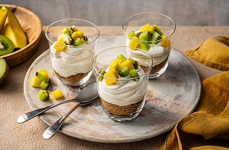Craving cheesecake? These simple-to-make mini cheesecake pots make a lovely lighter choice for pudding. The creamy vanilla filling is made from fat-free Greek yogurt and low-fat cream cheese, and topped with zingy kiwi and juicy mango for a fruity finishing touch!