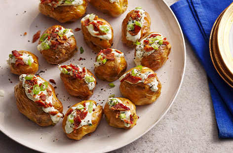 If you're looking for a delicious and easy-to-make appetiser or side dish, look no further than these mini Jersey 'Royal' jackets potatoes, made with just a few simple ingredients! 