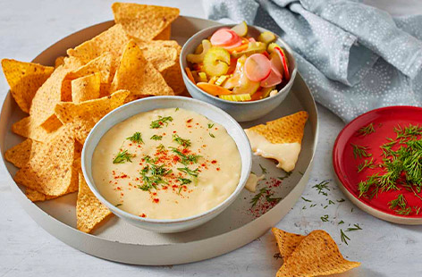 Use up whatever cheese you have in the fridge with this epic Scandi-style fondue. It's served with easy homemade pickles that can be made with any kind of veg. Grab your tortilla chips and get dipping - it's the ultimate film night snack!