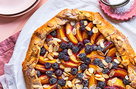 Everyone loves a flavour mash-up, and seasonal summer fruits get an almond croissant-style makeover in this easy free-form tart.