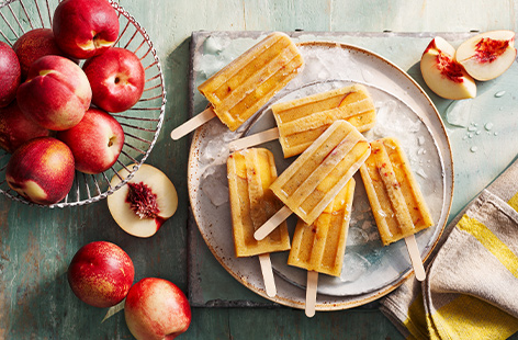 Cool off in the sunshine with the help of juicy, seasonal nectarine ice lollies
