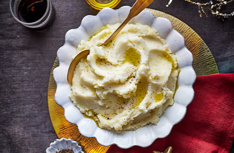 Olive oil, almond milk and roasted garlic help to take your classic mashed potato to the next level, making this a vegan must-make for your Christmas dinner.