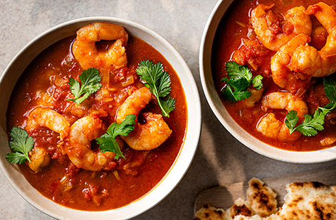 This easy prawn curry recipe takes just 25 minutes to bring to the table - perfect for a speedy midweek meal. The king prawns cook briefly until perfectly tender in the creamy coconut and tomato broth with a hit of jalfrezi spice.