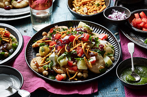 Combine potatoes with traditional Indian spices, coriander and mint chutney, and a chaat topping in this special dish