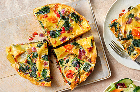 This veggie frittata is an easy and healthy dinner idea that comes together quickly. We've added in broken lasagne sheets for extra texture, but you could switch this out for sliced potatoes,, if you like. Serve with a crunchy salad and a dollop of mayo for dipping.