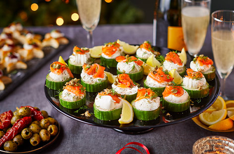 These tasty canapés are super easy to rustle up and look impressive too. Cucumber slices are topped with soft cheese, smoked salmon and dill. A good grind of rainbow peppercorns gives them a nice kick!