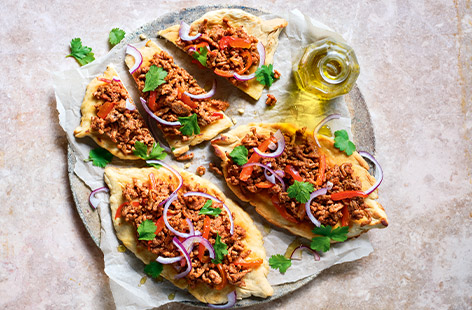 The perfect Friday night dinner, these spicy lamb flatbreads are ready in just 35 minutes!