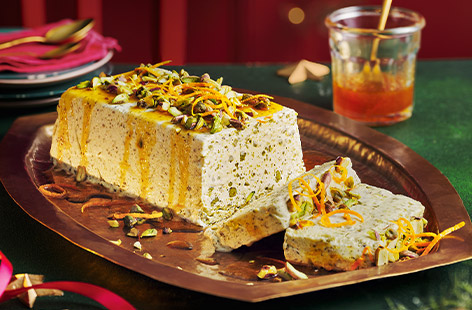 This spectacular yet simple-to-make ice-cream terrine is definitely one for your dessert table this Christmas. A homemade pistachio paste and an easy no-cook olive oil caramel makes this a game changer. This is creamy, luscious and decadent, just as festive desserts should be!