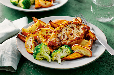 Coat your chunky pork steaks in honey and wholegrain mustard and serve with apple and sweet potato wedges - a lovely weeknight dinner for two
