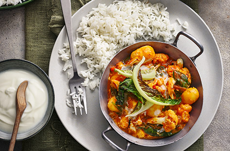 This vegetarian spin on a classic tikka masala curry recipe uses nutty cauliflower and tinned new potatoes