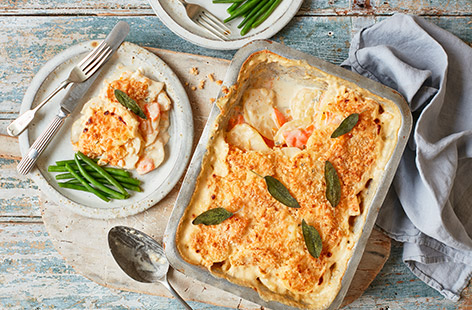 For veggie comfort food, try this potato and butternut squash gratin. Potatoes and squash are baked in a sage-infused cream and scattered with cheesy breadcrumbs for a winter warmer - serve with salad for dinner or as a side dish to your next Sunday roast.