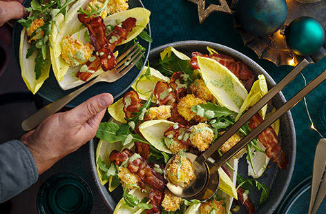 This festive take on the Caesar salad makes the most of frozen prawns and decadent pancetta rashers