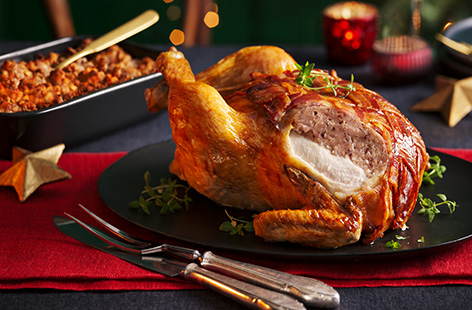 Mix up your Christmas dinner this year with this incredible festive centrepiece. Chicken is stuffed with brie and cranberry before being wrapped in bacon, then roasted until juicy and golden. Serve this budget-friendly main with all the trimmings.