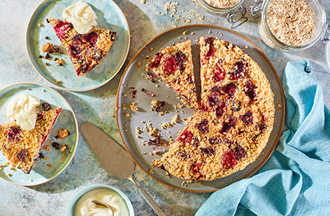 Make the most of summer fruit with this berry crumble tart recipe. A simple mixture of flour, butter, sugar and oats for extra flavour is divided to make a crisp tart crust and crunchy crumble topping, with a juicy mixed berry filling.