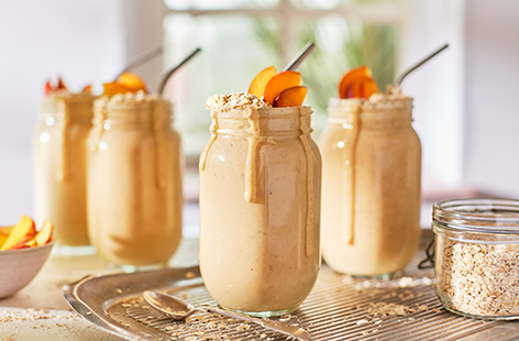 Blitz up a summer smoothie with this easy peach and oat smoothie recipe. Made with almond milk and vanilla yogurt for a vegan treat, blitz this together in 5 mins for a quick breakfast or afternoon treat.