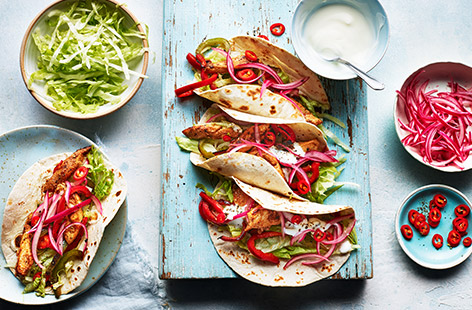 Spice up your midweek meals with these zingy chicken tacos that are ready in just over half an hour