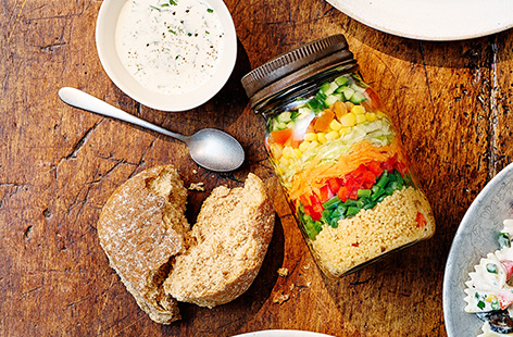Every kid will love their rainbow lunch full to the brim with salad, vegetables, couscous and a soft cheese dressing. 
