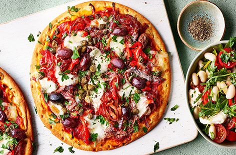 If you love anchovies on pizza, you'll go mad for this delicious and easy recipe, made with shop-bought sourdough pizza bases and loaded with bold Med flavours. There are Kalamata olives, capers, cannellini beans and plenty of vibrant veg – this is a pizza and a half! What's more, you'll have leftover veg for a tasty jambalaya (see step 4, below).