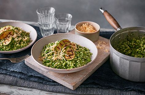 xxPack three different veg into your dinner with this creamy green veg risotto. With a quick homemade spinach sauce, colourful peas and griddled courgettes, this is the perfect spring twist on an Italian classic. 