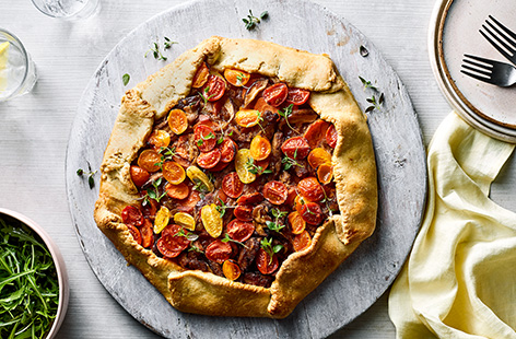 Make this showstopping galette from recipe writer, Denai Moore, for a wonderful Easter lunch. Spiced vegan chicken stew is encased in flaky pastry and topped with sweet cherry tomatoes. Tuck in!