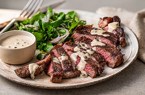 Serve up a deliciously tender steak with a creamy peppercorn sauce for a midweek treat.