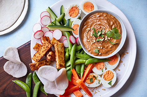 This is a picky tea with a twist! Fried tofu, hard-boiled eggs and lots of fresh veggies create a colourful spread, finished off with some leftover peanut dipping sauce from our Satay pork chops recipe, see step 4.