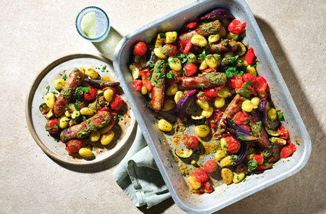 This is a real throw-it-all-in traybake that makes a fab family meal. Comforting gnocchi and tasty sausages make up the base, alongside plenty of chunky veg and cherry tomatoes for a pop of colour. Drizzled with pesto after baking, it's  full of flavour and super-satisfying!