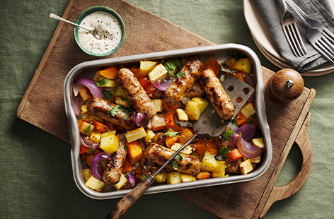 Packed with meaty Cumberland sausages and filled with seasonal veg goodness, this traybake feeds a family of 4 and requires minimal washing up