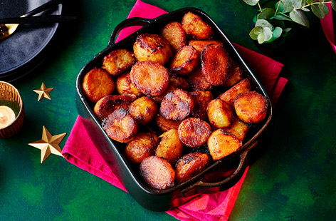 Crunchy and super-tasty, everyone will be talking about your roasties, but you needn't let anyone know the secret ingredient if you don't want to! Perfect for Christmas dinner, a special Sunday lunch or any roast dinner.