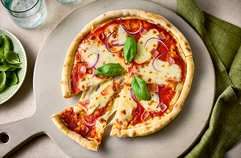 Meals by Mitch's budget-friendly pizzas are made in a skillet pan and are ready in just 30 minutes! We've topped ours with ham and veggies, but you can customise yours with your family's favourite toppings. 