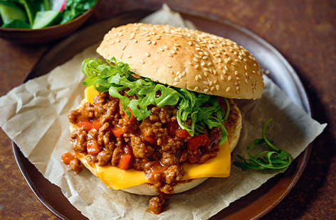 Use leftover beef and onion mixture in this Sloppy Joes recipe to make this American classic for a bonus Friday night special. Sandwiched between golden grilled seeded buns, serve with melty cheese slices, tangy gherkins and crisp salad.