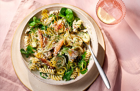 This delicious summery dinner is like a posh tuna pasta salad but instead of tuna we've used smoked mackerel and dressed everything in a lemony, horseradish-spiked crème fraîche dressing. Use up any leftover mackerel for lunch the next day – see recipe, below.