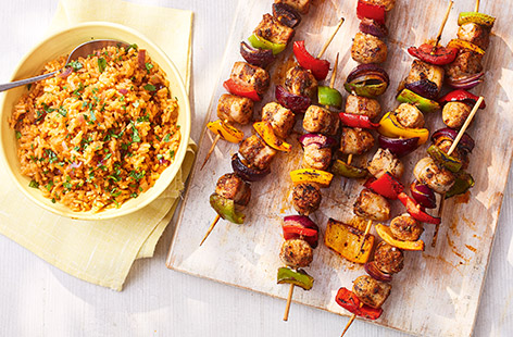These garlicky, herby sausage and veg skewers are a tasty and interesting twist on traditional meat kebabs and budget-friendly too. Serve on a bed of tomato rice for a tasty midweek meal. 