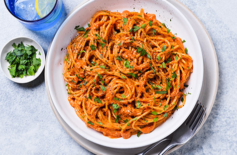 Try our cheat's version of this Spanish romesco sauce featuring red peppers, tomatoes and almonds. It's rich, sweet and tangy all at once, healthy and vegan! It could be your new go-to pasta sauce when you're in a hurry.