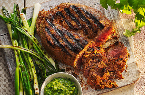 It's time to get grilling! This beef joint is spiced with cumin and paprika for a smoky marinade. Drizzle over a quick coriander chimichurri for zingy freshness. This make-ahead dish is perfect for all your summer hosting occasions. If you don't fancy using the barbecue, you can cook the beef in the oven.