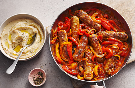 Take the stress out of cooking with this flavour-packed spicy sausage one-pot wonder with butter bean mash.
