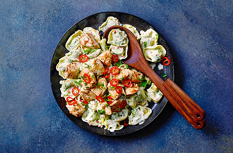 Ginger, garlic and chilli give this easy pasta dish delicious heat and zing, balanced by the simple crème fraîche sauce
