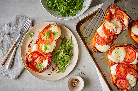 Pizza, but not as you know it! This pizza baked squash recipe is an easy way to start eating more veg. Top roasted butternut squash with tangy sundried tomato paste, juicy tomatoes and melting mozzarella for classic pizza flavours.