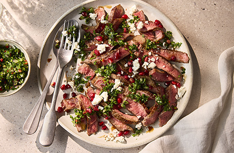 If you're looking for an extra-special steak dish, this chimichurri recipe delivers big on flavour without demanding hours in the kitchen. Tender and richly flavoured sirloin steaks are perfectly complemented by the herby chimichurri sauce and salty feta. Sprinkle over some juicy pomegranate seeds for a restaurant-quality meal you can enjoy at home.