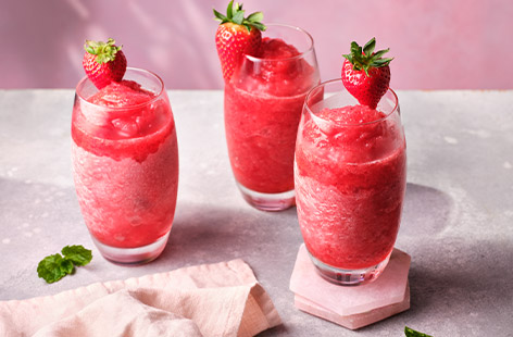 Quench your thirst and elevate your summer gatherings with our tasty strawberry rosé slushies. This delightful blend creates a vibrant pink slushie that is as beautiful as it is delicious.