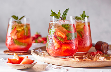 Looking for a new summer cocktail recipe? Make this strawberry crush in 5 mins, perfect for a Friday night sundowner. Muddle together juicy strawberries, low-alcohol beer and fresh mint for a sweet summer drink.
