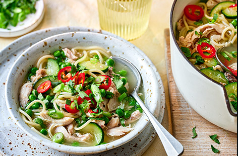 Chicken noodle soup just got summery! This fresh and wholesome soup makes a lovely, filling family dinner for sunny evenings. It's also a great way to pack in some green veg, just adjust the chilli topping depending on tastebuds.