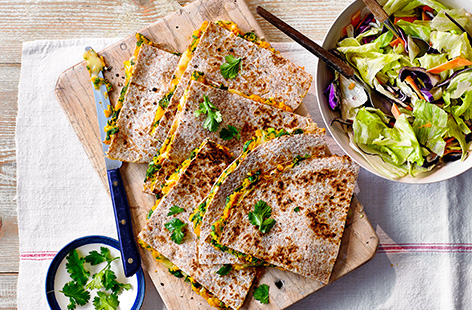 Have a healthy Mexican-inspired dinner with this healthy sweet potato and spinach quesadilla recipe. Sweet potatoes are mashed with coriander, spinach and spring onions for a healthy, veg-filled quesadilla.
