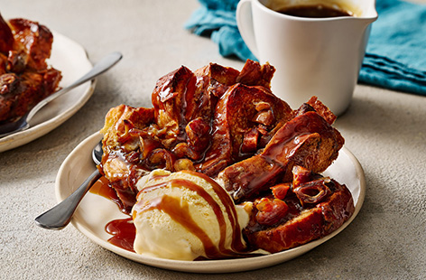 A delicious merging of two British classics – this indulgent pudding combines soft white bread slices with a wonderfully gooey sticky toffee sauce