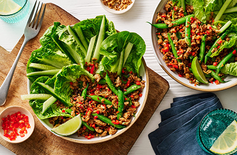 Larb is a popular Thai salad that's made with mince. This chicken version is flavoured with lemongrass and ginger, then served on a bed of crunchy lettuce and cucumber. Refreshing and a little spicy, this is a lovely salad for those warmer summer months.