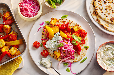 This colourful paneer traybake is packed with veggies and full of Indian-inspired flavours. It tastes even better with warm flatbreads and raita on the side.