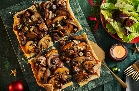 This stunning vegan galette is topped with miso-glazed roasted mushrooms and chestnuts to make a delicious Christmas dinner main.