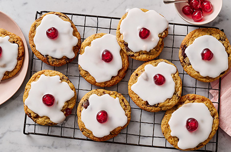These cute cherry Bakewell cookies are a great edible gift idea for Valentine's Day. Studded with dark chocolate chunks and salted almonds, then finished with a cherry on top, you won't get a sweeter Valentine's date.
