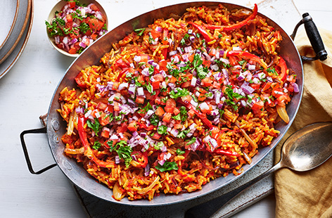 Jollof rice is a popular West African recipe that consists of rice cooked in a spicy tomato stew
